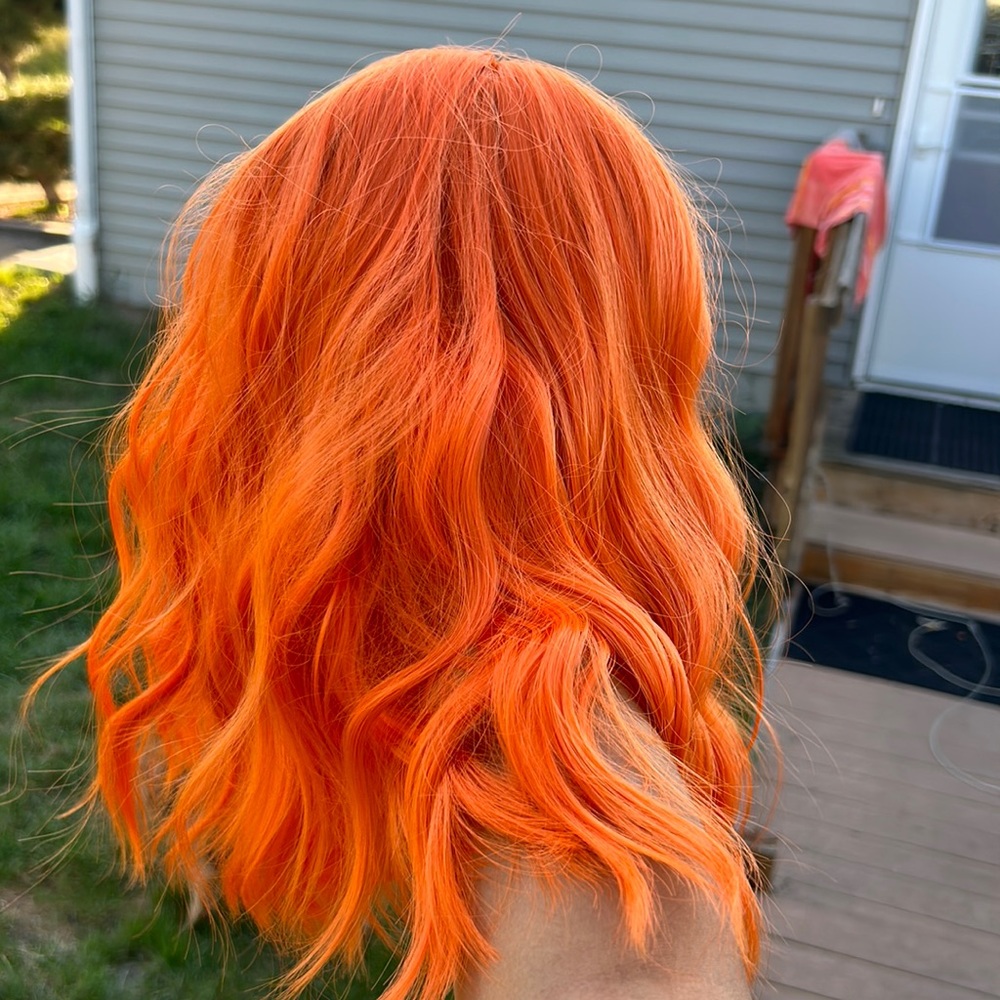 Orange medium length wig with bangs
